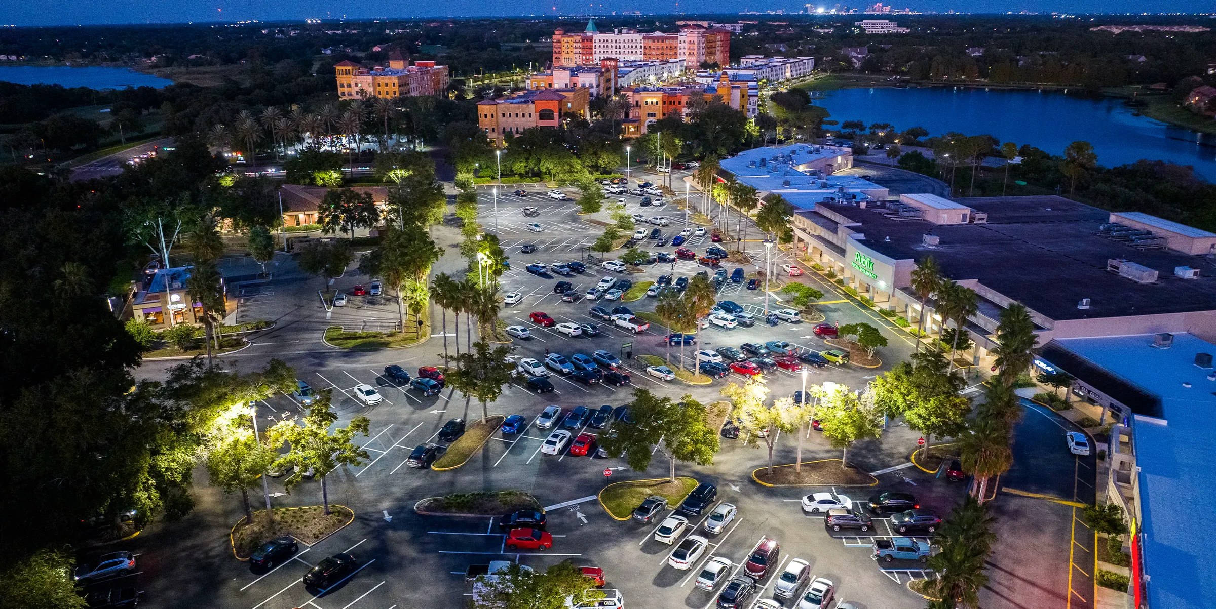 MetroWest Village retail property lit at night